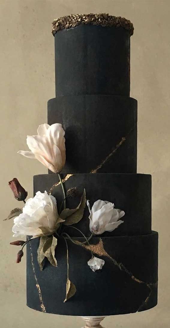 black wedding cake, black wedding cake trends, buttercream wedding cake, black cake with flowers 