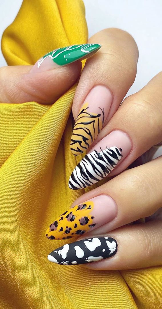 mismatched animal print nails, nail trends 2020, different color nails on each hand, leopard nails, nail designs, nail art, animal print nails , nail designs 2020, leopard print nails, leopard print nails 2020, leopard nails design, cheetah nails, animal print nails 2020
