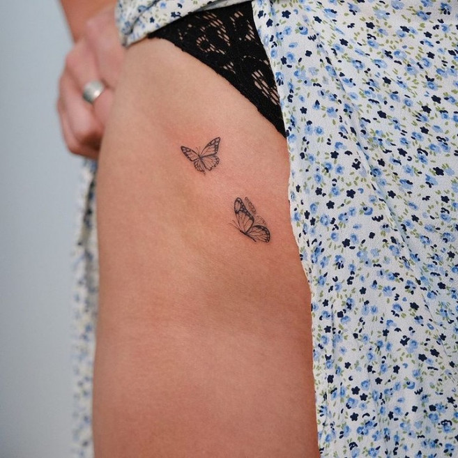 Purple Flowers And Butterfly Thigh Tattoos