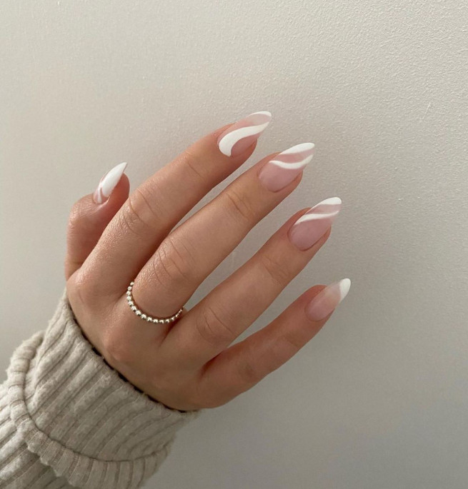 white swirl nails, spring nails 2022, spring nail ideas, pastel nails, floral nails, flower nail designs 2022, daisy nails, french tip nails, colored french tip nails