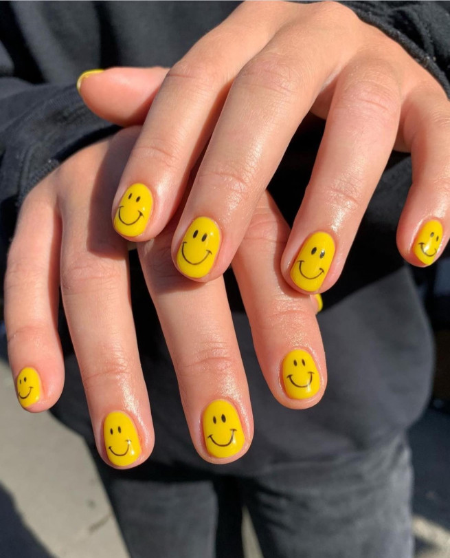 40 Cutest Summer Nail Designs in 2022 : Bright Yellow Smiley Face Nail Art