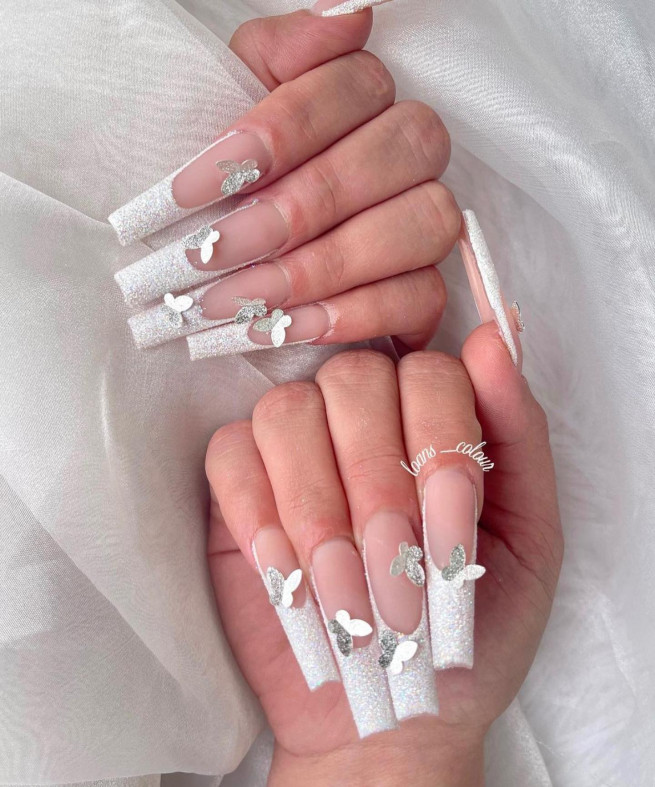 40 Cute Acrylic Nails To Wear This Spring : White French Tip Acrylic Nails with Silver Butterflies