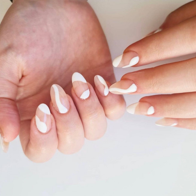 nude nails with white lines, nude nail designs 2022, nude nails 2022, classy nude nails, nude nails with design, acrylic nails with white outline, almond nails with white lines, white line nail design, white swirl nails, white french nails, almond nails, white swirl almond nails