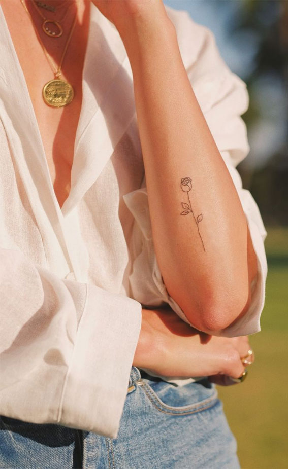 Alexis Ren Roman Numeral Elbow Tattoo  Steal Her Style