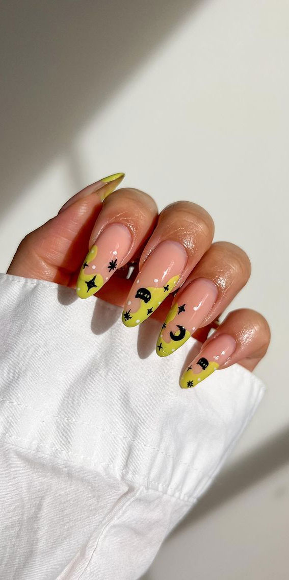 30+ Spooky Halloween Nail Ideas : Green Swoopy Tips with Moon & Stars
