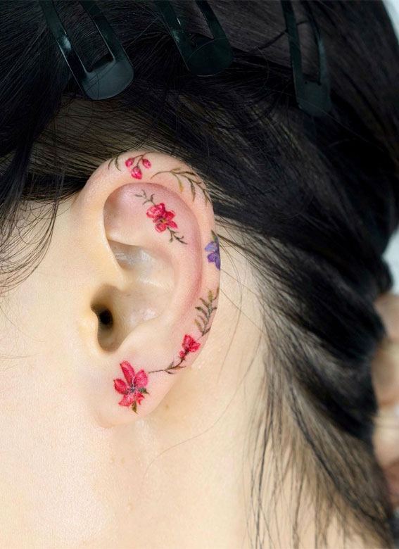 30+ Beautiful Flower Tattoo Ideas : Colourful Tiny Flower Tattoo on Ear
