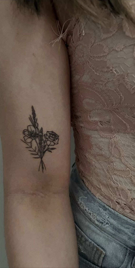 Black Ink Roses Tattoo On Left Upper Arm