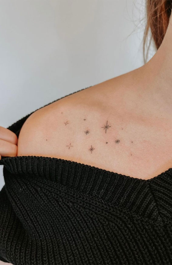 Small stars tattoo on shoulder and back