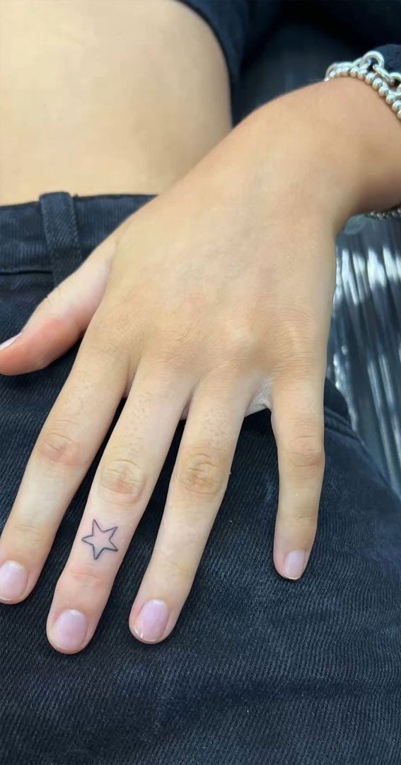 25 Beautiful Hand Tattoo Ideas : A Star