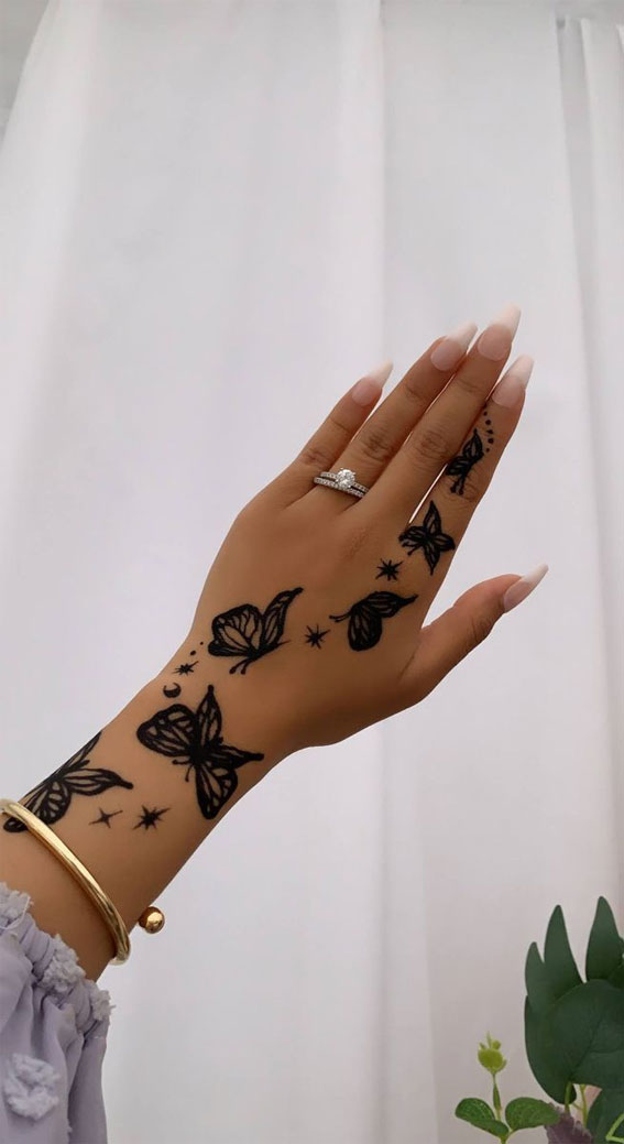 butterfly hand tattooTikTok Search