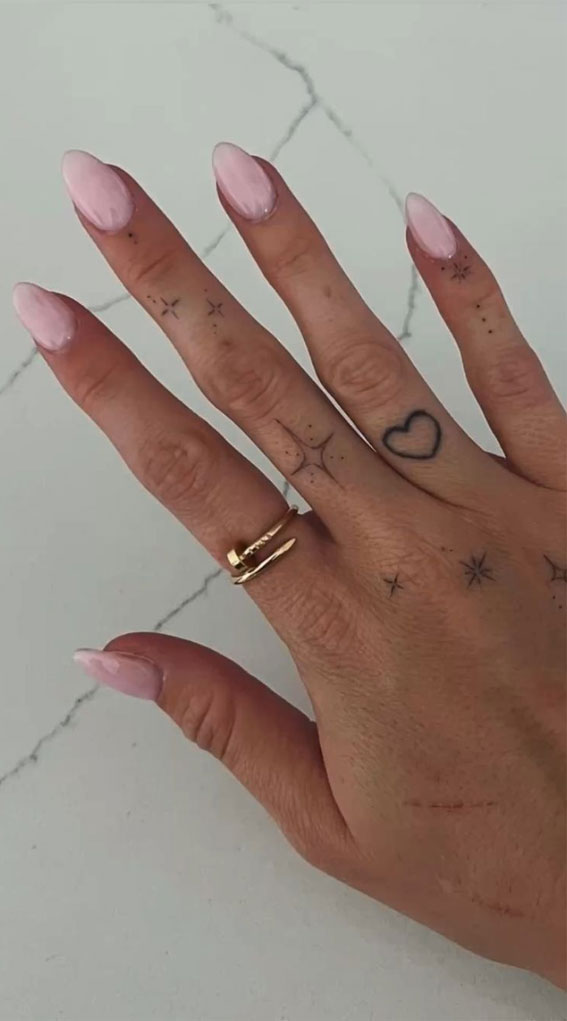 25 Beautiful Hand Tattoo Ideas : Love Heart on Fourth Finger