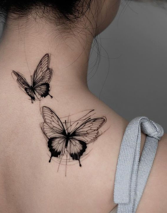 Outline Tribal Butterfly Tattoo On Back Shoulder