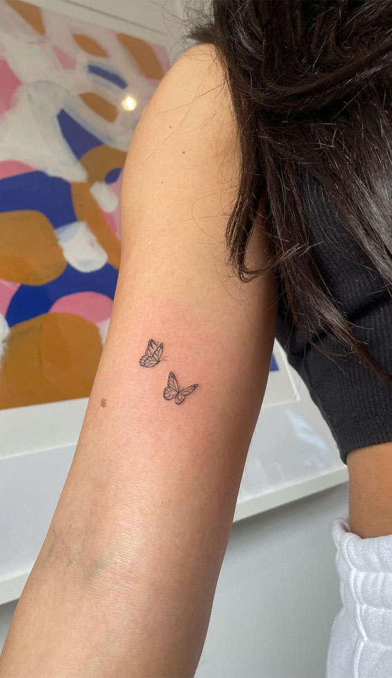 Two small butterfly tattoos
