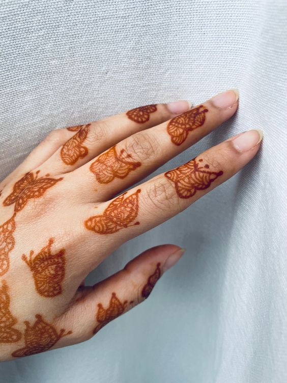 70 Minimal Henna Designs : Butterfly Henna on Hand
