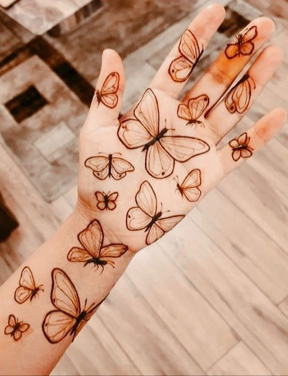 70 Minimal Henna Designs : Butterfly Henna Design on Palm