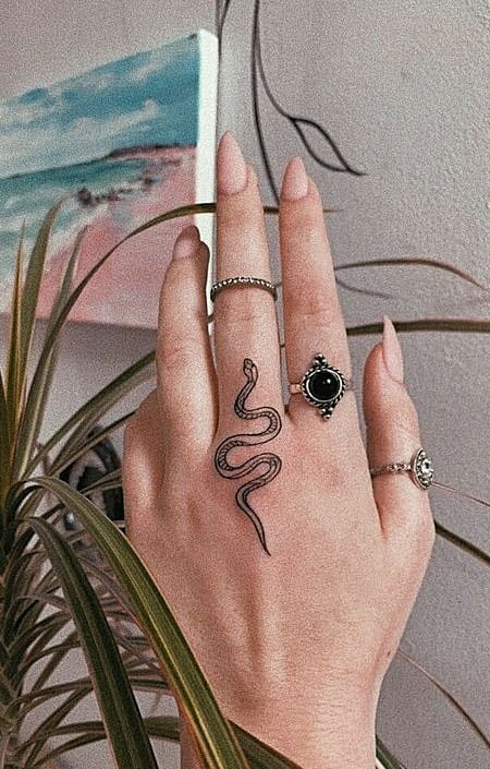 Ink Embrace Artistry on the Hand : Snake Tattoo
