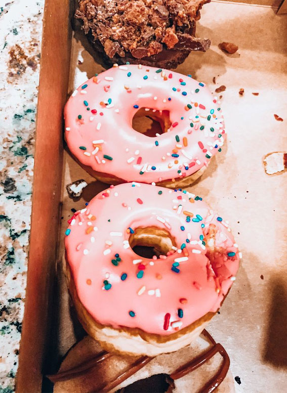 Feast for the Senses Captivating Food Aesthetics : Pink Donuts Topped with Sprinkles