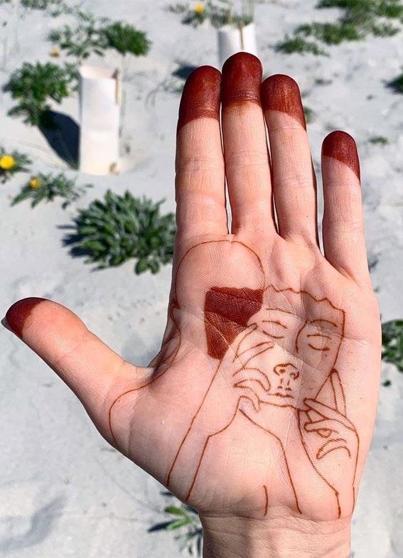 50 Timeless Allure of Henna Designs : Two-Faced Henna Art