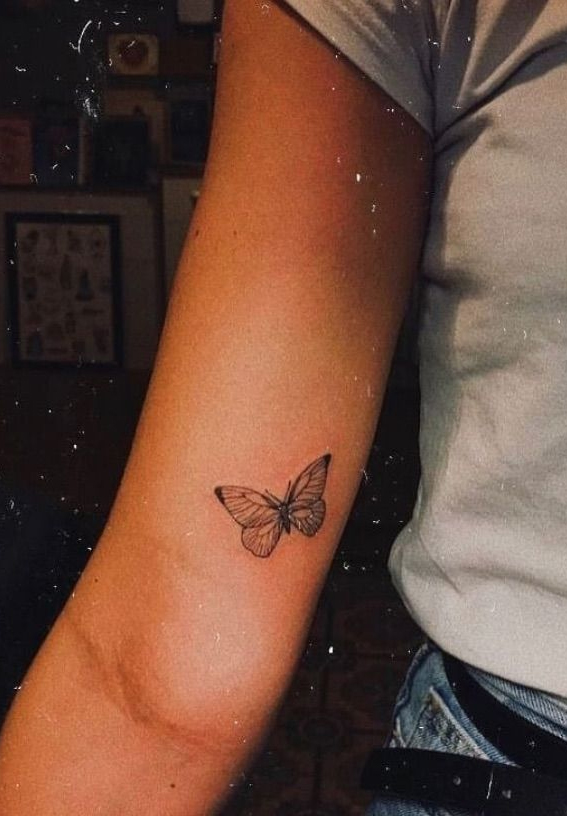 Ink Fusion Where Art and Identity Meet : A Butterfly Tattoo on Arm