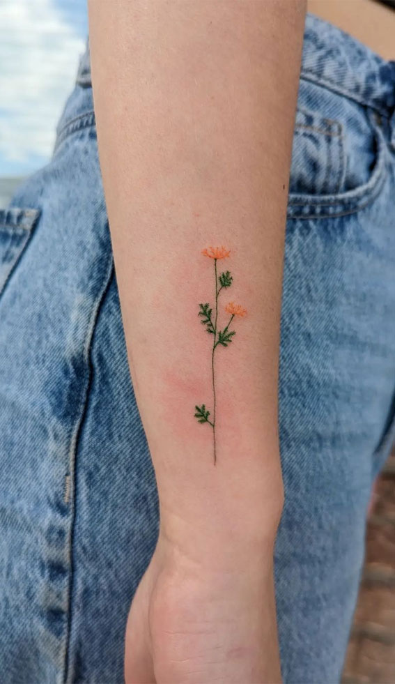 Ink Fusion Where Art and Identity Meet : Orange Flower Dainty Tattoos