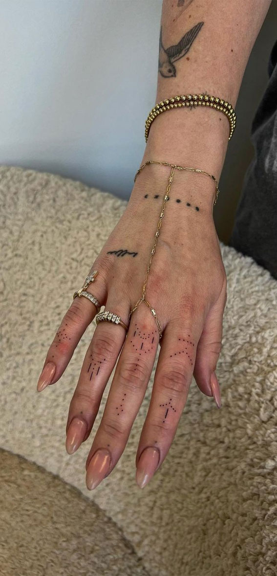 50 Small Tattoo Ideas Less is More : Little Ornaments on Fingers