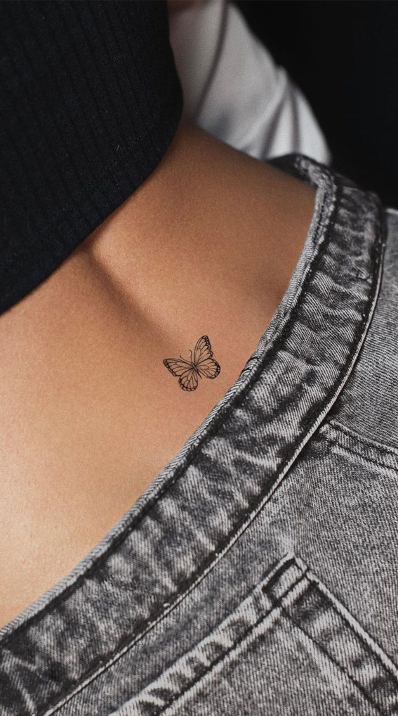 Ink Fusion Where Art and Identity Meet : A Butterfly Tattoo on Lower Back