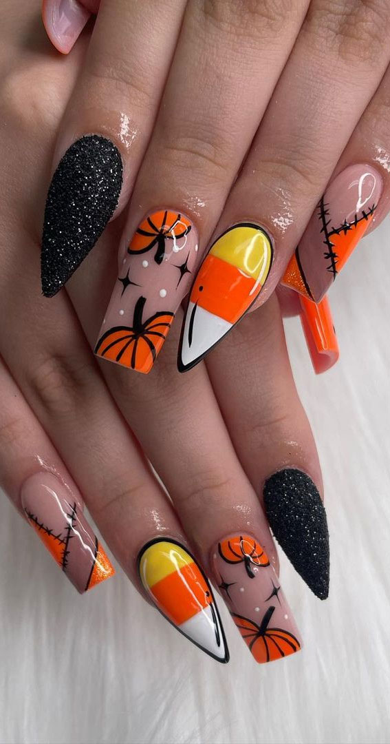 Enchanting Halloween Nail Art Ideas : Pumpkin + Candy Corn Comic Nails