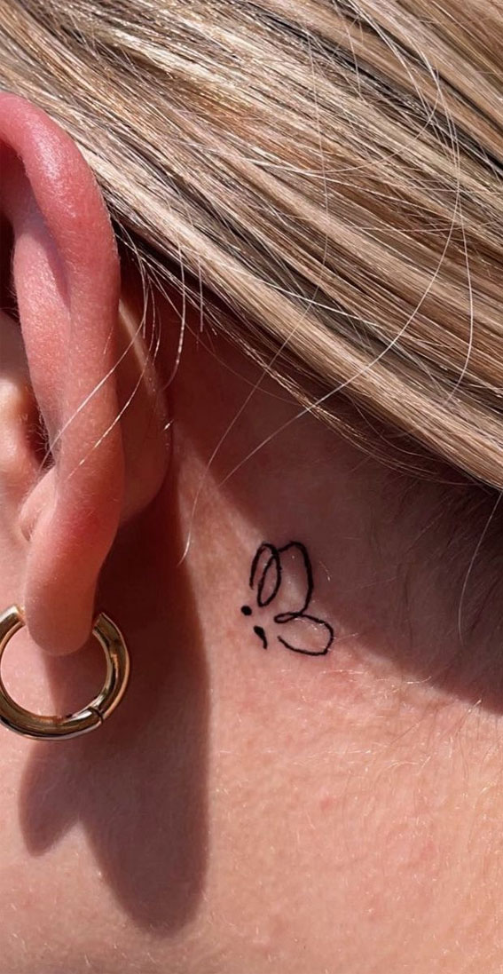 Whispered Ink 40 The Beauty of Ear Tattoos : Butterfly Outline Behind Ear Tattoo