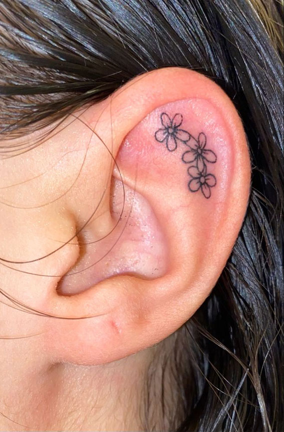 Whispered Ink 40 The Beauty of Ear Tattoos : Flower Outline Inside Ear Tattoo