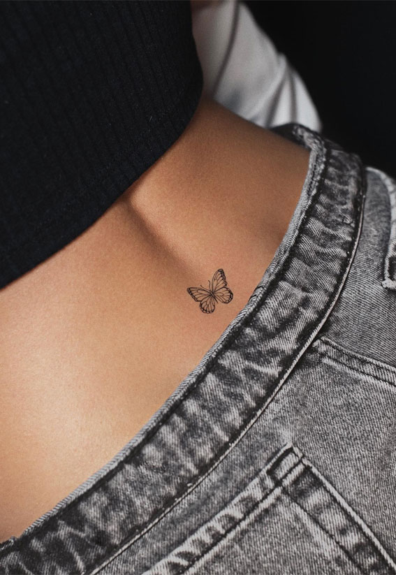 50 Petite Tattoo Ideas : A Butterfly Lower Back Tattoo