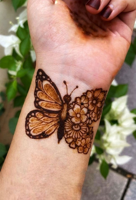Fluttering Elegance 23 Enchanting Butterfly Henna Designs : Flowering Butterfly on Wrist
