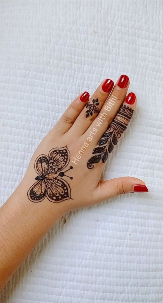 Fluttering Elegance 23 Enchanting Butterfly Henna Designs : Large Butterfly & Garland Finger