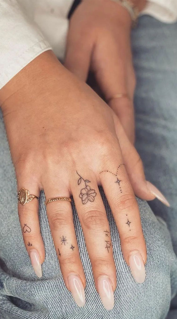 Tiny Treasures Meaningful Small Tattoo Inspirations : Flower & Small Hand Tattoos