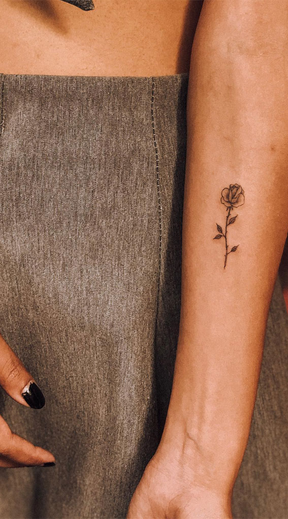 Tiny Treasures Meaningful Small Tattoo Inspirations : Black Rose on Arm