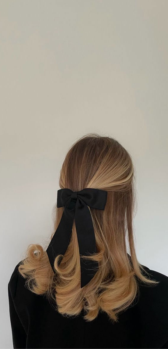 40 Effortlessly Adorable Hairstyles for Every Day : Bouncy Hair Easy Half Up with Black Bow