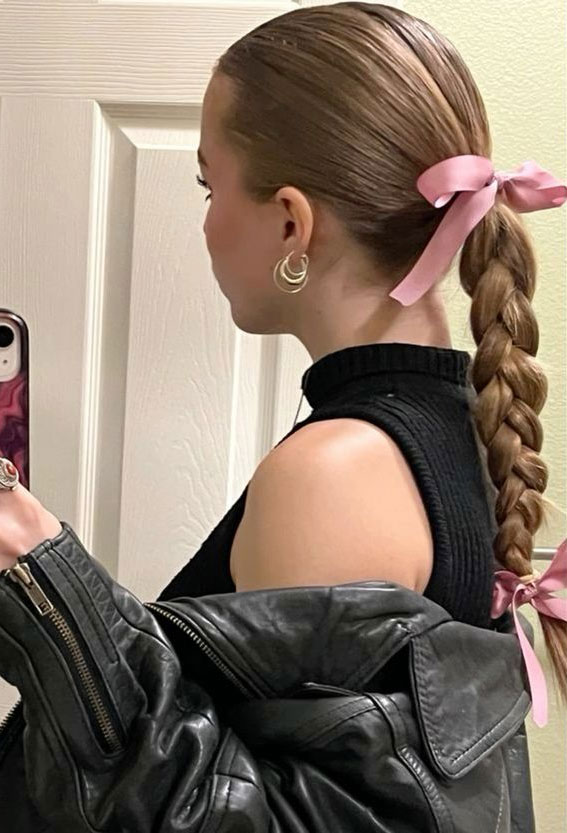 40 Effortlessly Adorable Hairstyles for Every Day : Sleek & Simple Braid with Pink Bows