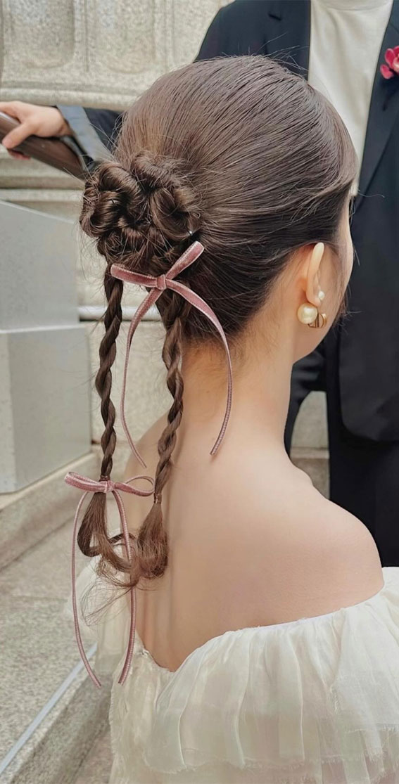 On-Trend Bow Hairstyles for a Chic and Playful Look : Bun with Twisted Pigtails + Tiny Bows