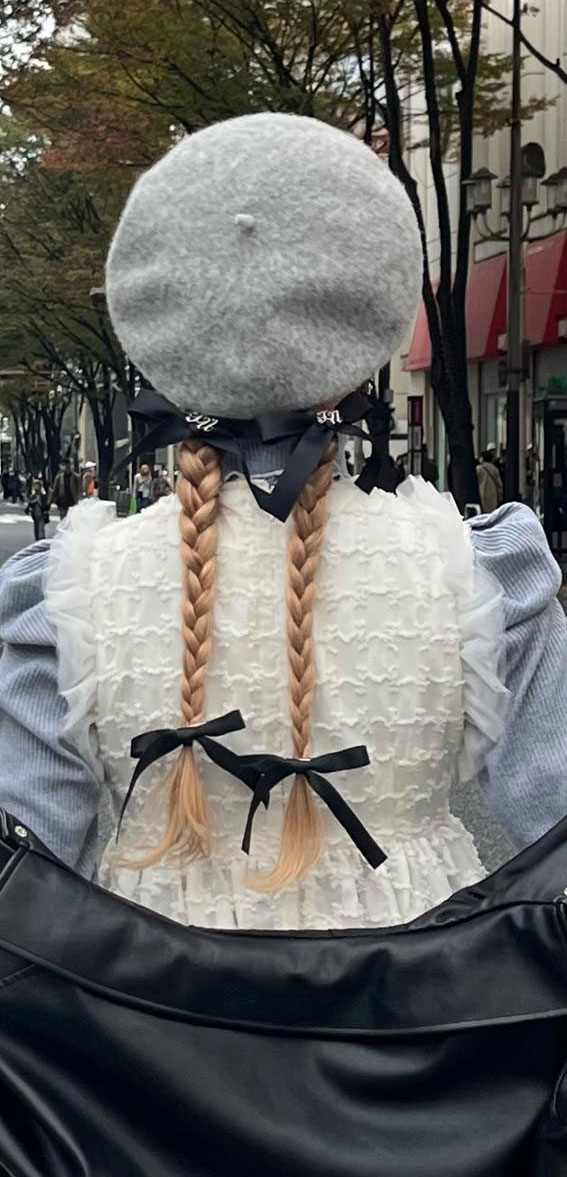 On-Trend Bow Hairstyles for a Chic and Playful Look : Simple Braid Pigtails + Four Bows