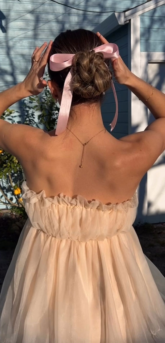 half up half down with bow, easy half up with bow, easy bun hairstyle with bow, bow hairstyles, bubble braid with bow, bun with bow cute hairstyle, coquette hairstyle, bubble ponytail with bow, everyday hairstyle, ponytail with bow