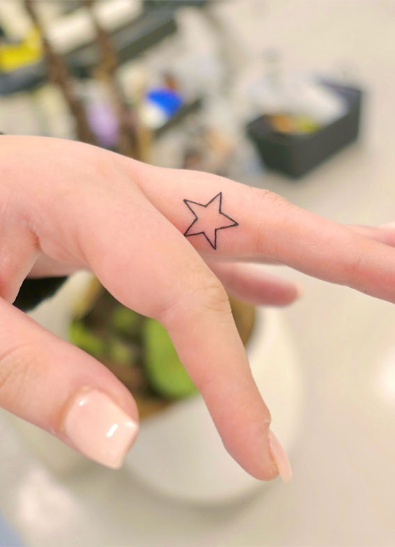 Celestial Charms 20+ Star Tattoo Designs : Star Outline Finger Tattoo
