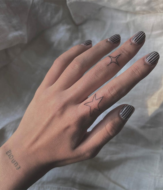 Celestial Charms 20+ Star Tattoo Designs : Stars on Fingers