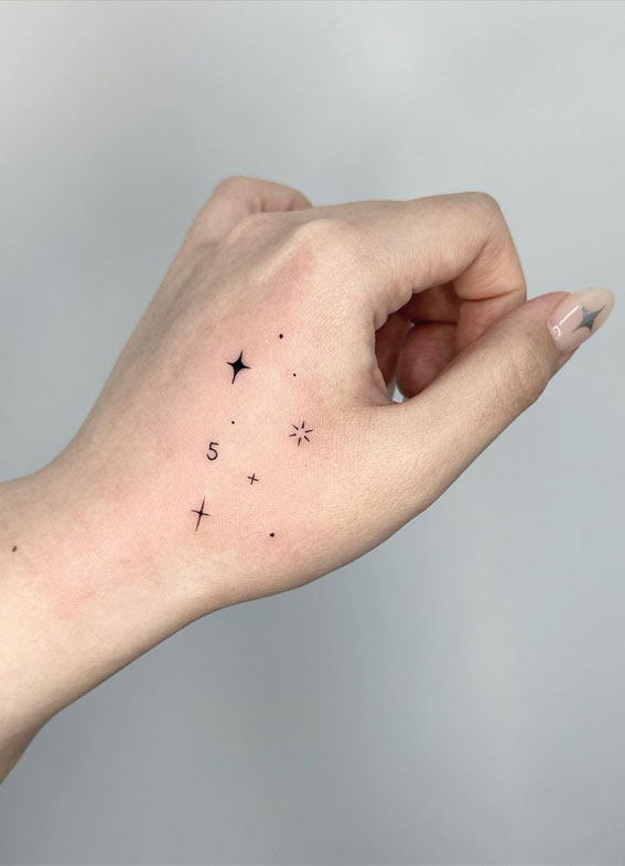 Celestial Charms 20+ Star Tattoo Designs : Shimmery Stars on Hand Matching Nail
