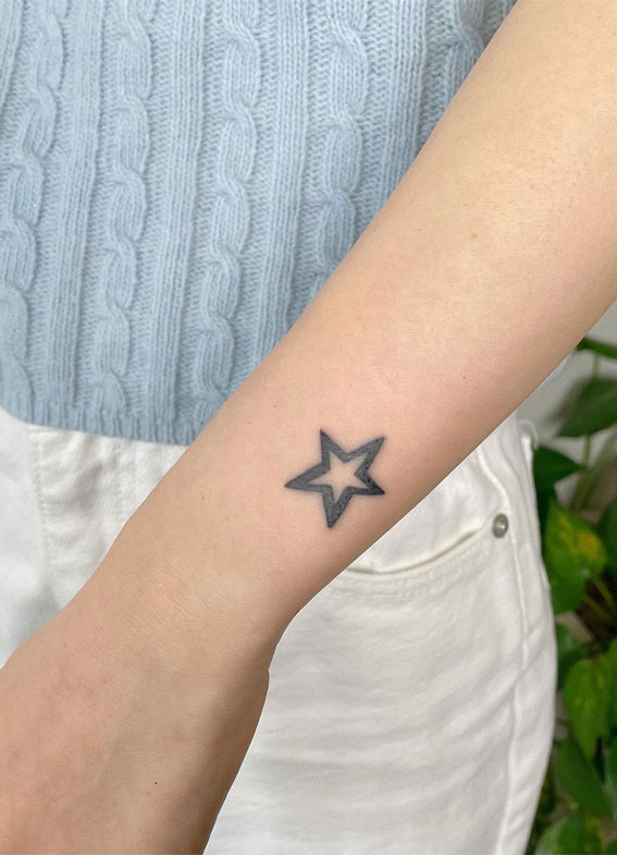 Celestial Charms 20+ Star Tattoo Designs : A Star on Arm