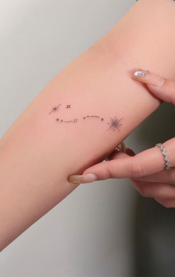 Celestial Charms 20+ Star Tattoo Designs : Sparkly Star on Arm