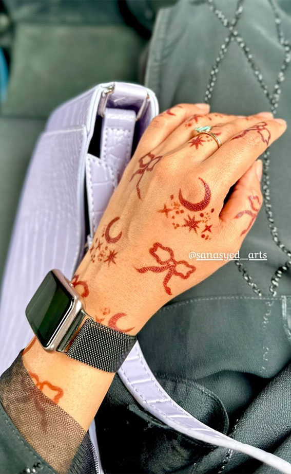 33 Trendy Henna Designs To Inspire : Trendy Bow & Crescent Moon Henna on Hand