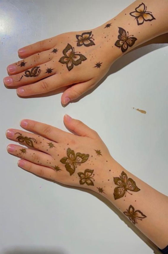 25 Mesmerizing Henna Designs : Butterfly Henna on Hand & Arm