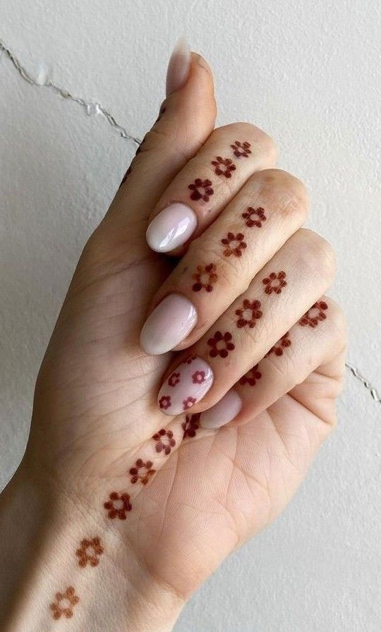 25 Mesmerizing Henna Designs : Little Flower Henna On Fingers