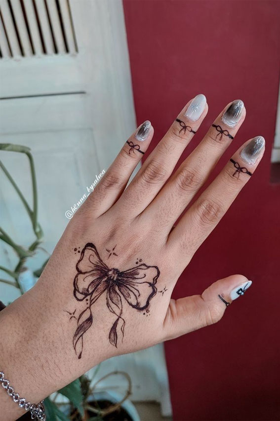 25 Mesmerizing Henna Designs : Bow Henna on Hand & Bow Rings